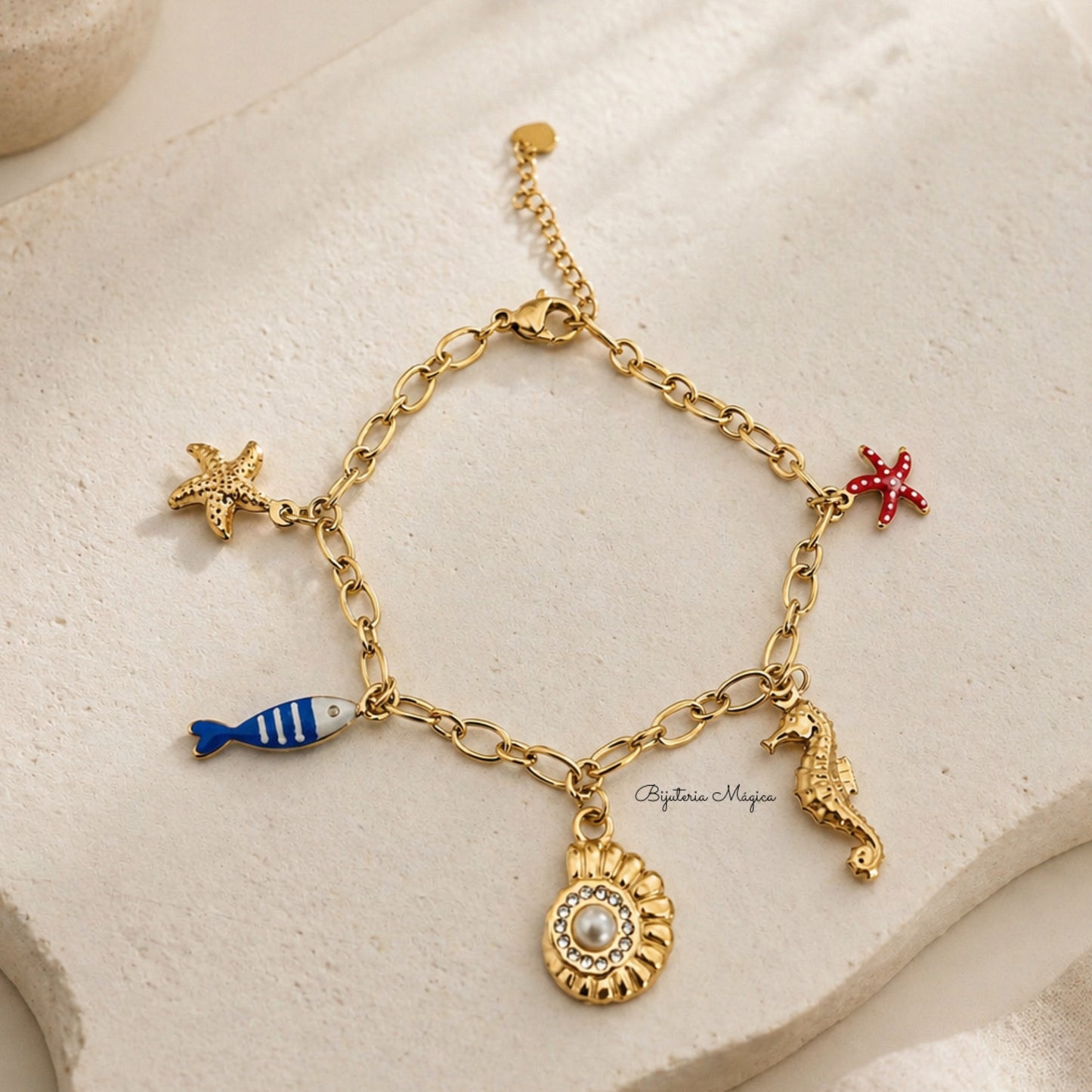 Pulseira Charms Marinhos Dourada em Aço Inoxidável