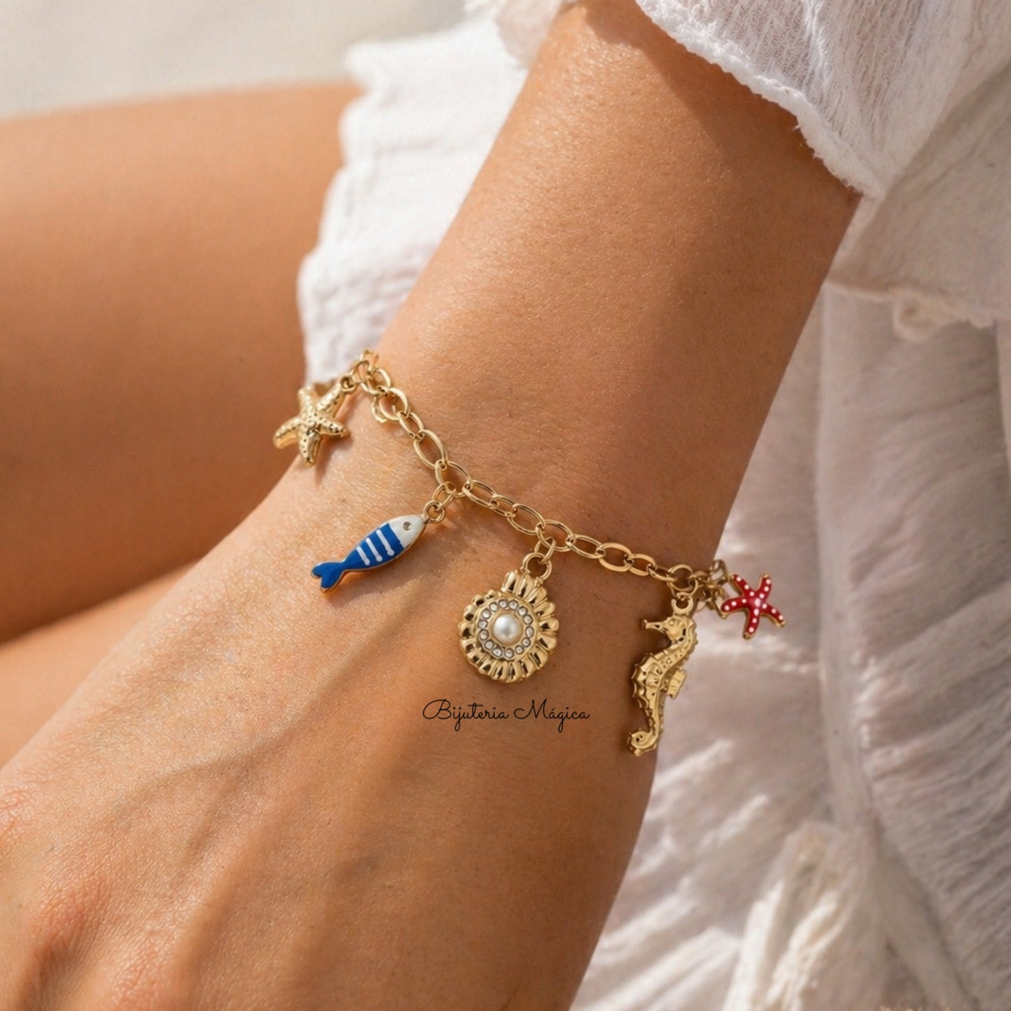 Pulseira Charms Marinhos Dourada em Aço Inoxidável