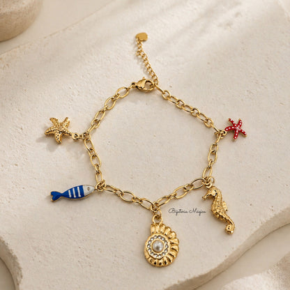 Pulseira Charms Marinhos Dourada em Aço Inoxidável