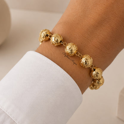 Pulseira Esferas Douradas em Aço Inoxidável