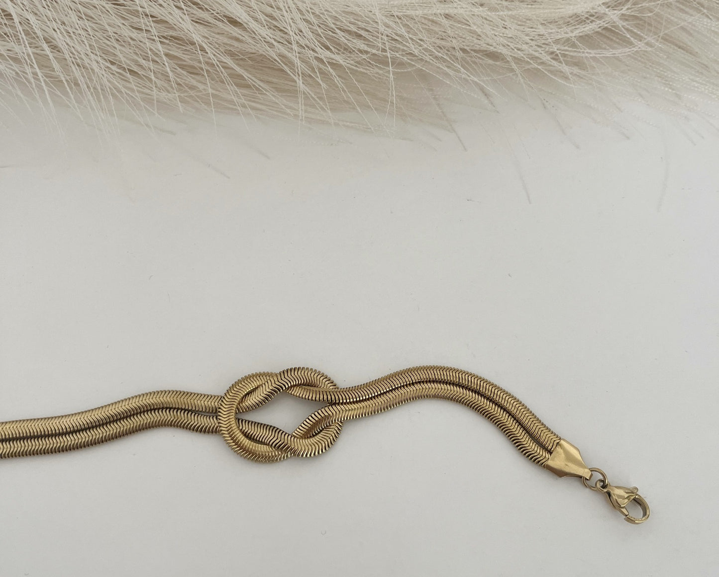 Pulseira Nó Dourado